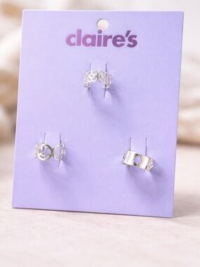 ⚠️ 5/25: Claire’s Silver Cutout Floral & Star Ear Cudf Trio